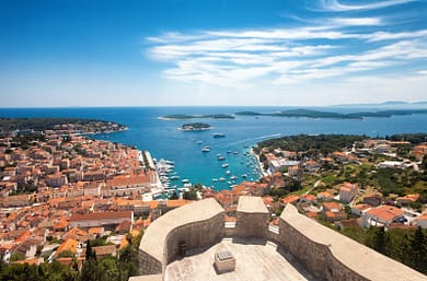 Wide angle aerial view of Hvar city and the bay from the Spanish view of Hvar city and the bay from the Spanish fortress